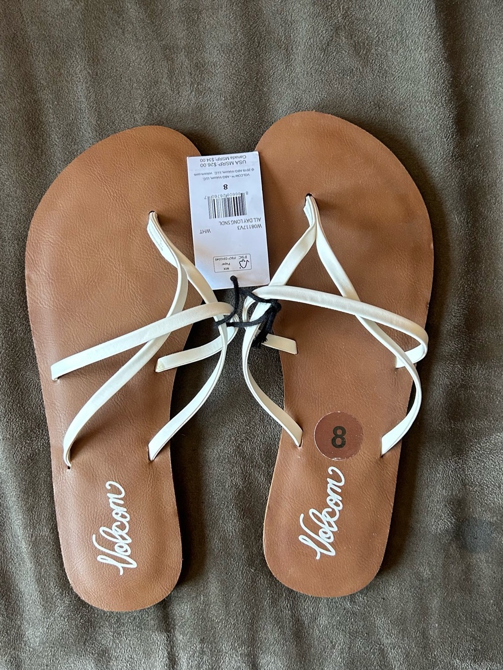 Volcom White Strap Flip-Flops with Brown Patterned Soles